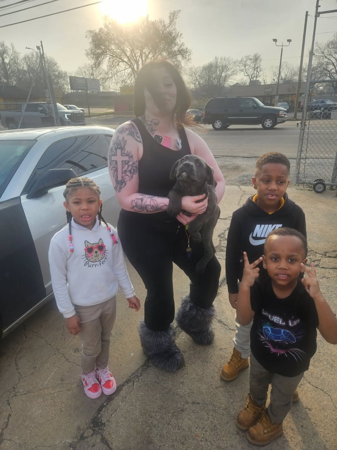 A family with their Heaven Sent puppy
