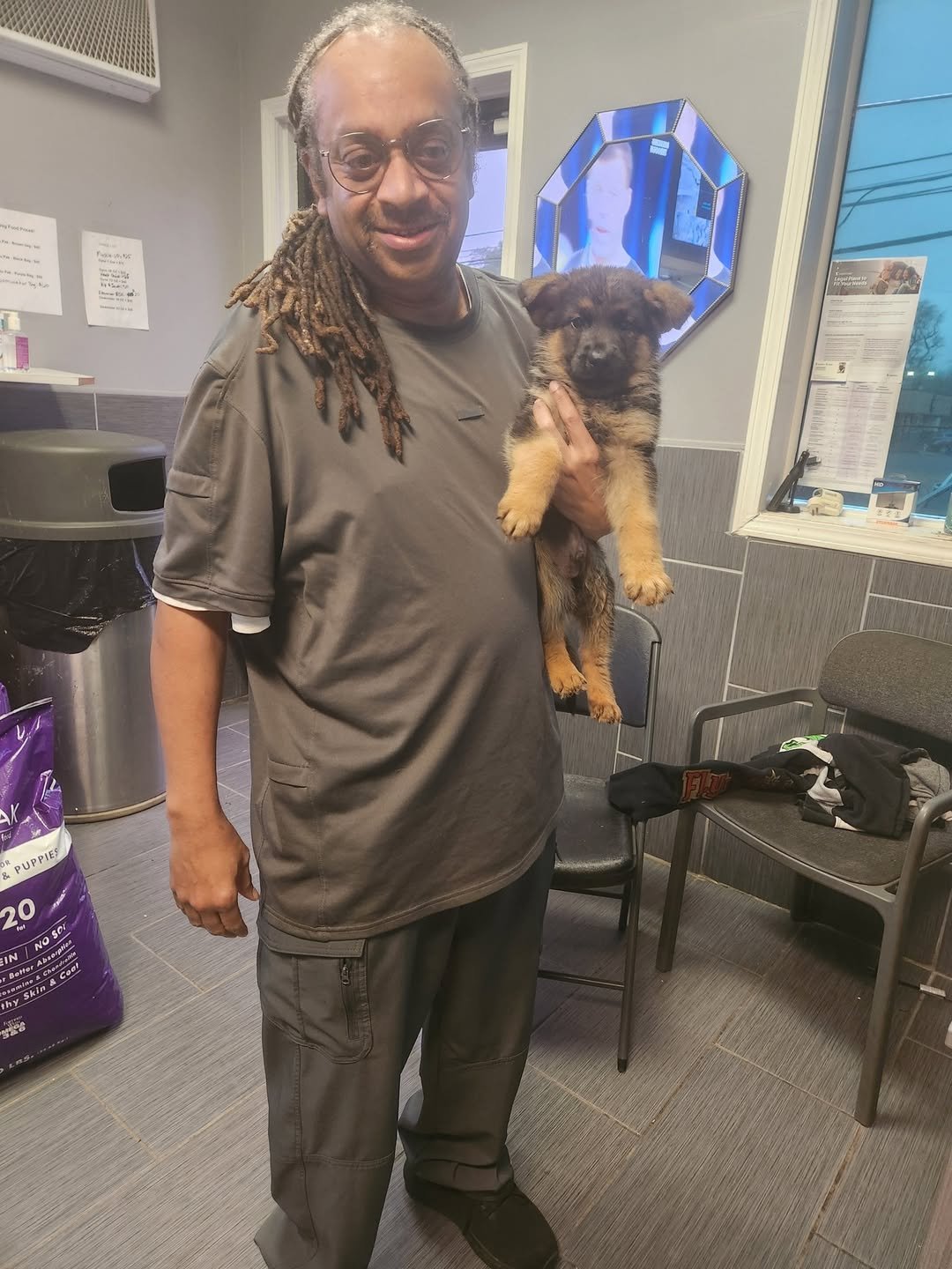 An HSK customer with a German Shepherd puppy